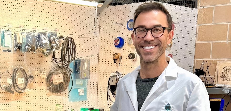David Roberson in a lab coat