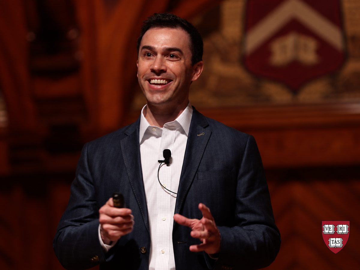 David Roberson giving his Harvard Horizons talk on stage at Harvard